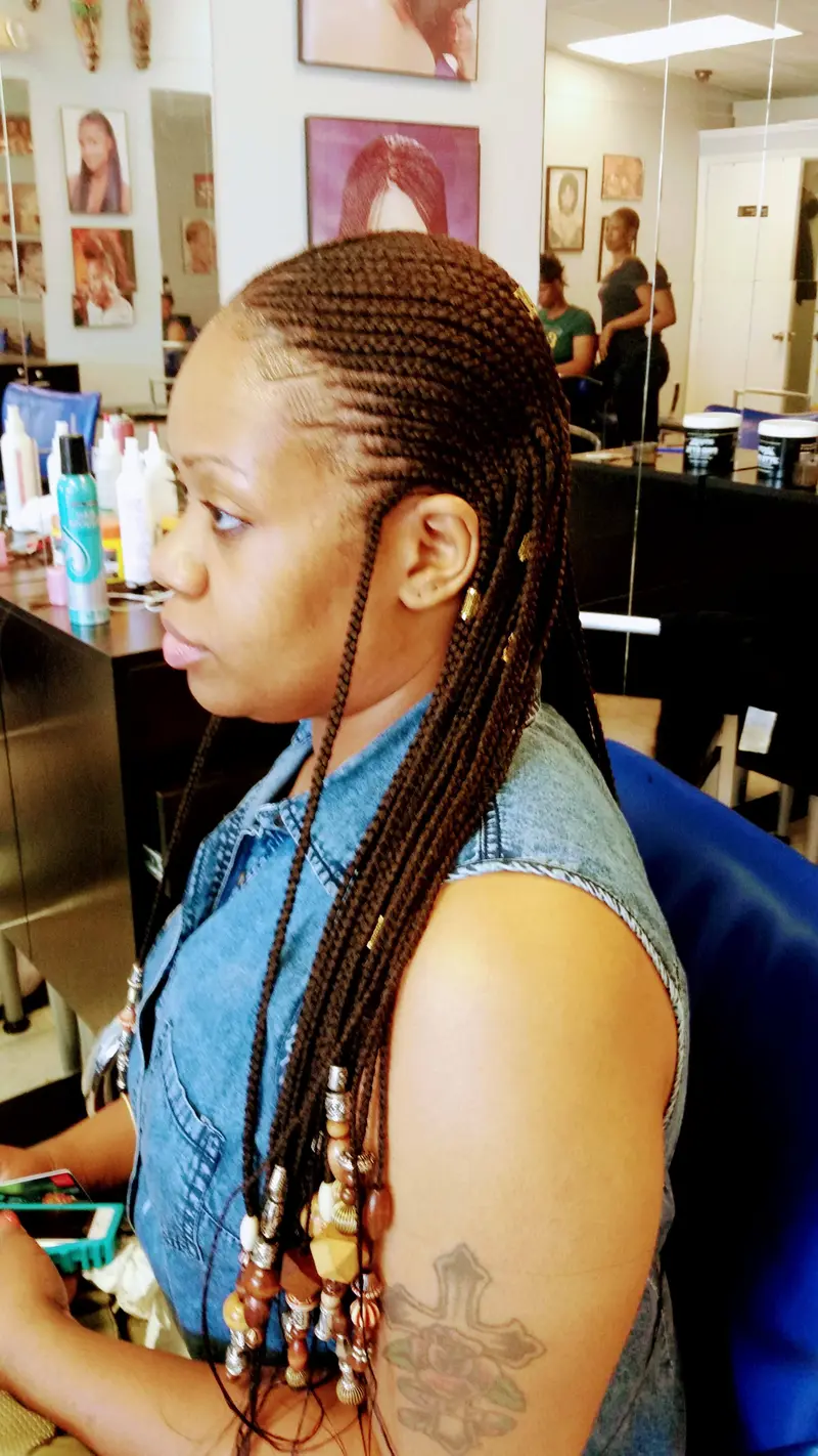 Cornrows hairstyle by Isa's African Hair Braiding in Savannah, GA (photo 94)