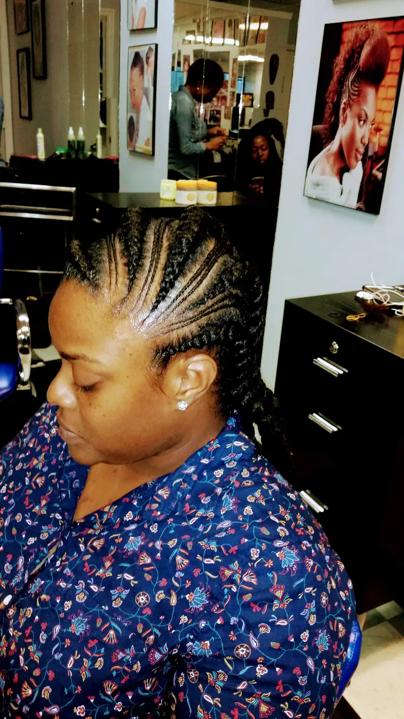 Cornrows hairstyle by Isa's African Hair Braiding in Savannah, GA (photo 86)