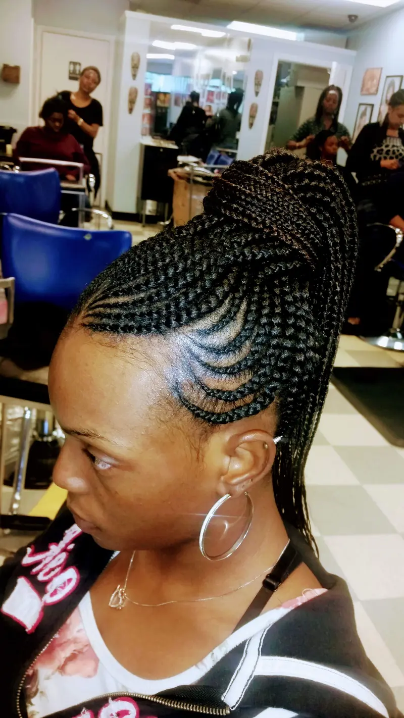 Cornrows hairstyle by Isa's African Hair Braiding in Savannah, GA (photo 81)