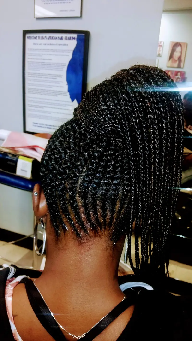 Cornrows hairstyle by Isa's African Hair Braiding in Savannah, GA (photo 80)