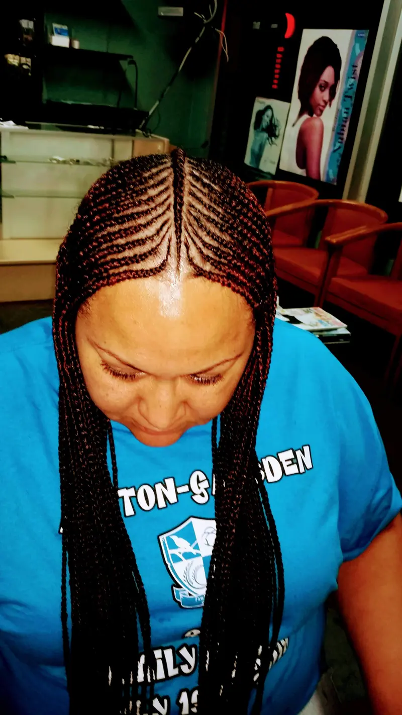 Cornrows hairstyle by Isa's African Hair Braiding in Savannah, GA (photo 77)