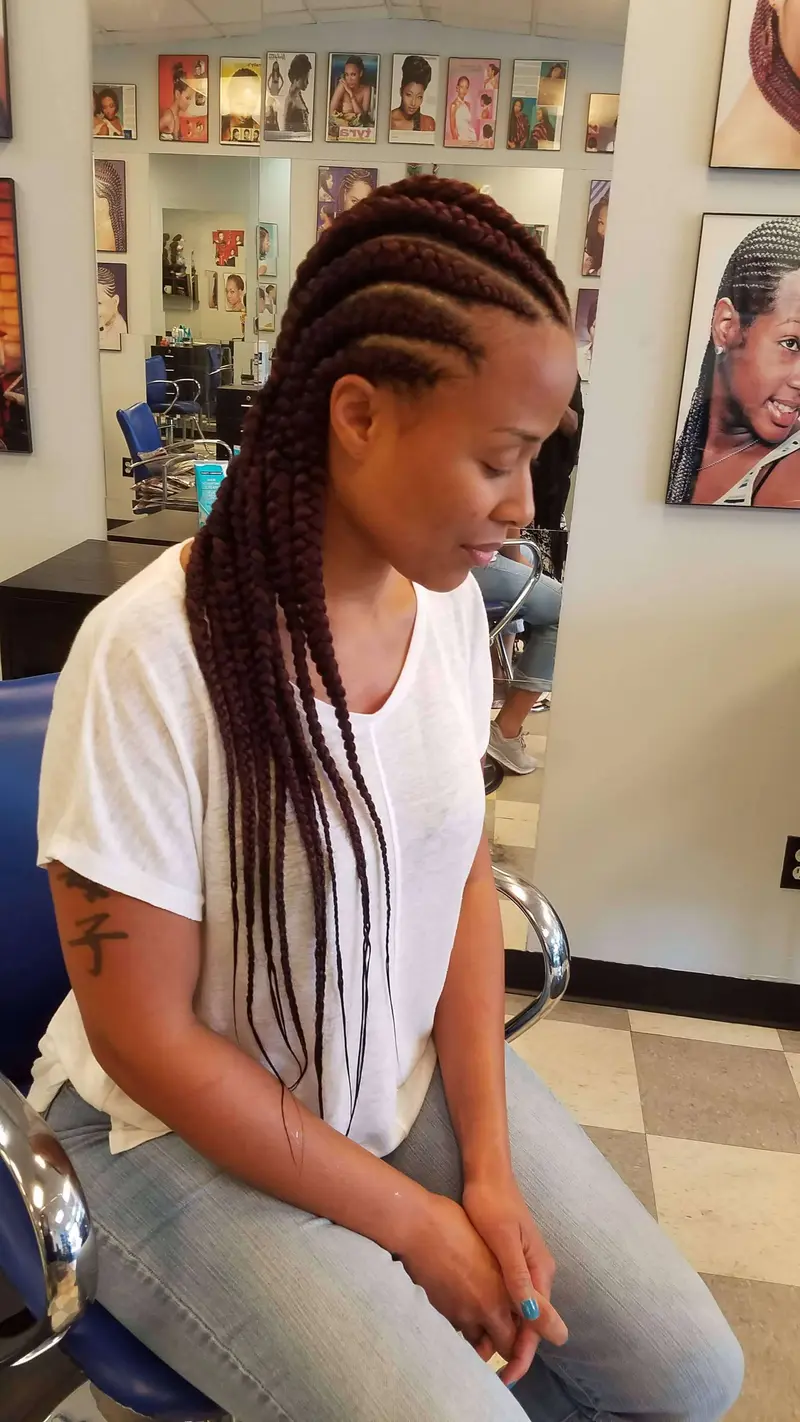 Cornrows hairstyle by Isa's African Hair Braiding in Savannah, GA (photo 76)