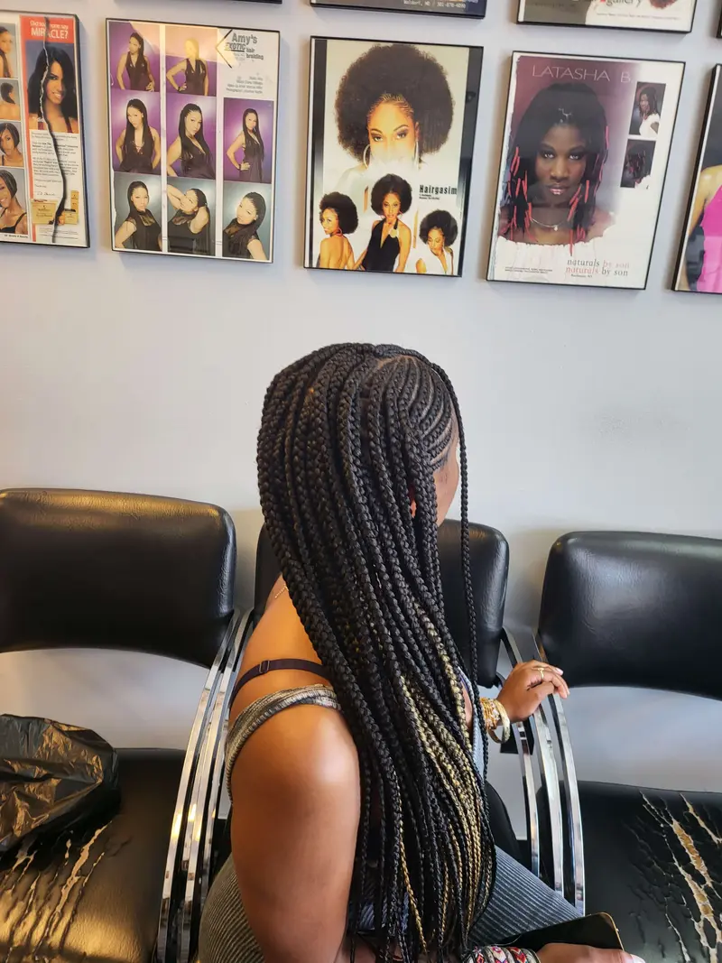 Cornrows hairstyle by Isa's African Hair Braiding in Savannah, GA (photo 72)