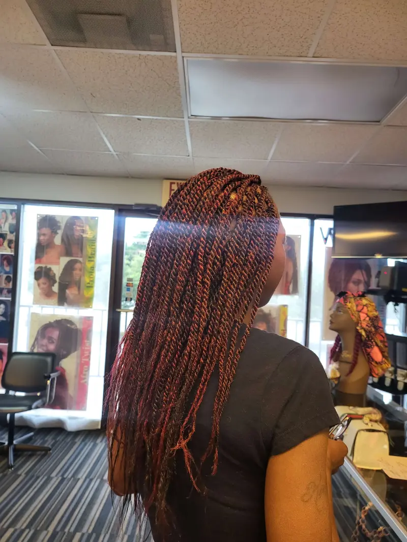 Twists hairstyle by Isa's African Hair Braiding in Savannah, GA (photo 5)