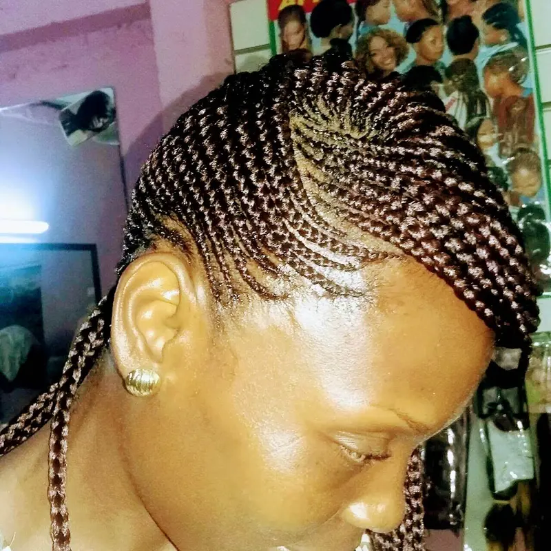 Cornrows hairstyle by Isa's African Hair Braiding in Savannah, GA (photo 44)